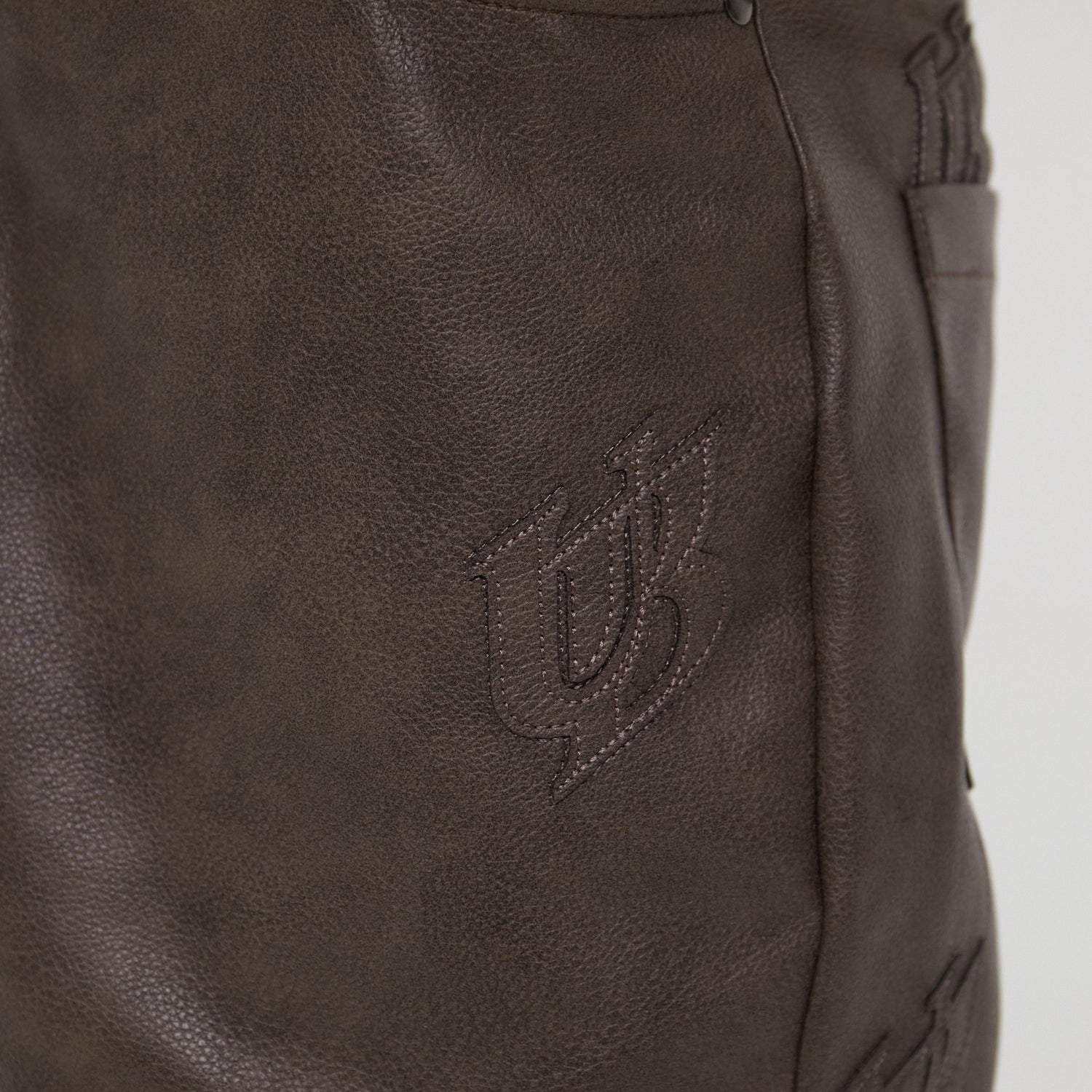 UB PATCH LEATHER PANTS